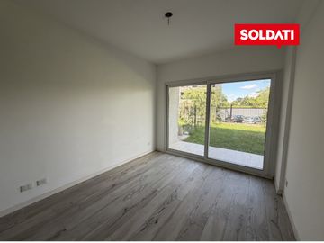 Departamento con jardín en Distrito Zug Caamaño Pilar – 2 ambientes, parrilla y 2 cocheras