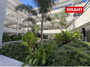 Departamento con jardín en Distrito Zug Caamaño Pilar – 2 ambientes, parrilla y 2 cocheras