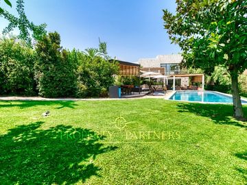 Espectacular Casa en El Huinganal con amplio jardín y cancha de Padle