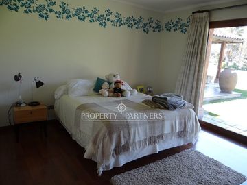 Casa en parcela en lujoso Condominio con vista a Cancha de Golf