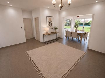 Venta - Casa  con 2 lotes - Barrio Los Pinos - Exaltación de la Cruz