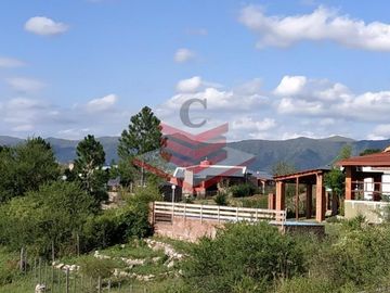 CASA EN SIQUIMAN, CON VISTA A LAS SIERRAS, A 300MTS RIO Y  800MTS DE RUTA NAC 38 REF: 1703