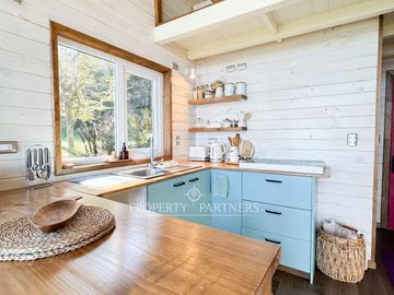 Espectacular casa con tiny house independiente y vistas al mar · Pichiquillaipe, Carretera Austral, Puerto Montt
