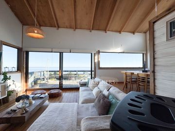 Espectacular casa con tiny house independiente y vistas al mar · Pichiquillaipe, Carretera Austral, Puerto Montt
