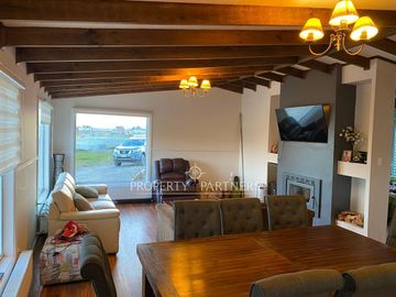 Se vende terreno con linda y acogedora casa en sector Loteo Vrsalovic