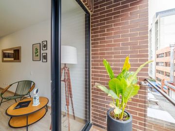 Apartaestudio en venta de 57m² con balcón en Bogotá, Chicó Norte.