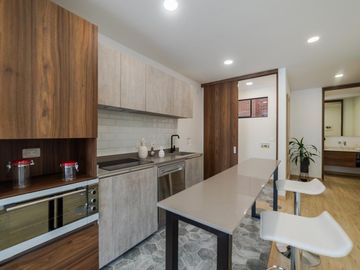 Apartaestudio en venta de 57m² con balcón en Bogotá, Chicó Norte.