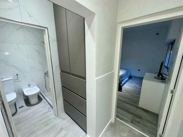 CASA EN VENTA A ESTRENAR 2 DORMITORIOS Y JARDIN