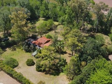 CASA 2 DORMITORIOS UBICADA SOBRE UN TERRENO 6000 M