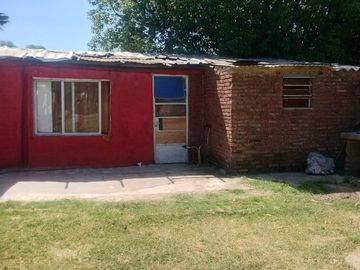 LOTE CON MEJORAS - LIBERTAD. MERLO