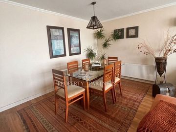 Se vende departamento en sector residencial poniente con amplios espacios, finas terminaciones y hermosa vista
