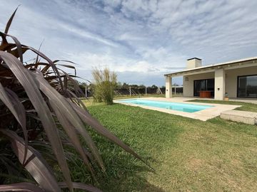 LOTE CON QUINCHO Y PILETA