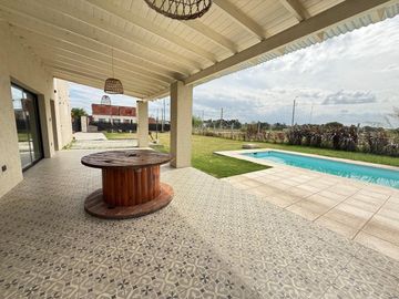 LOTE CON QUINCHO Y PILETA