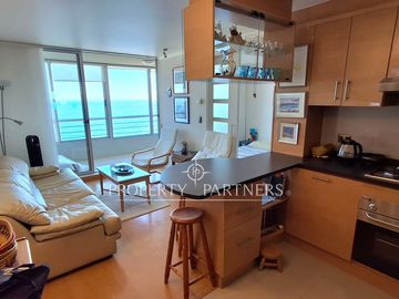En exclusiva departamento con espectacular terraza con hermosa vista al mar