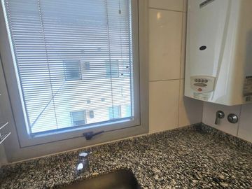 Depto 2 amb en venta con cochera Parque Chacabuco