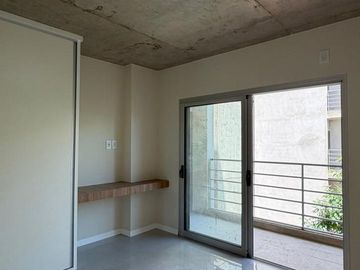 VENTA DPTO UN DORMITORIO CON COCHERA EDIFICO RIO2