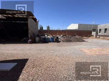 TERRENO EN VENTA EN AV. ZARAGOZA CON BODEGAS