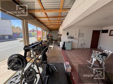 TERRENO EN VENTA EN AV. ZARAGOZA CON BODEGAS