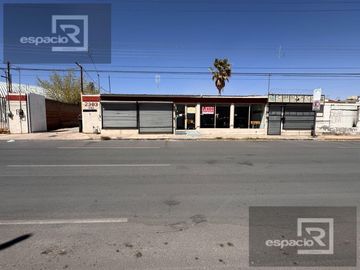 TERRENO EN VENTA EN AV. ZARAGOZA CON BODEGAS
