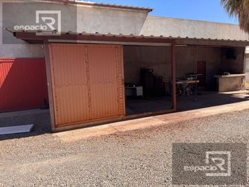 TERRENO EN VENTA EN AV. ZARAGOZA CON BODEGAS