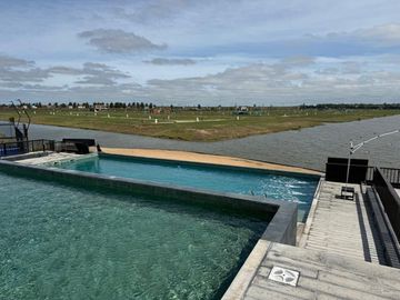VENTA LOTE  FUNES LAKES FRENTE SUR - OPORTUNIDAD!!