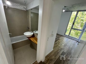Alquiler de departamento 2 ambientes con terraza, parrilla y cochera en Moreno
