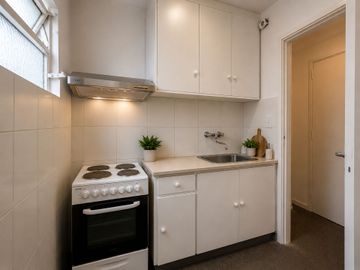 VENTA 2 AMBIENTES BAJO BELGRANO con GRAN JARDIN
