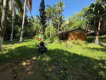 Terreno con casa de campo en Zihuatanejo