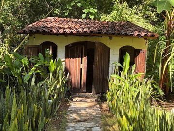 Terreno con casa de campo en Zihuatanejo