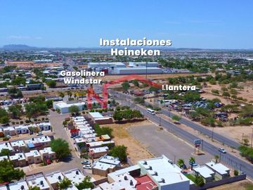 TERRENO CON CONSTRUCCION EN VENTA SOBRE BLVD. QUIROGA EN FRACC. TIERRA COLORADA