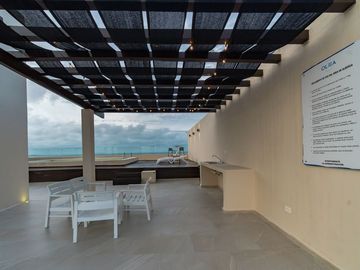 DEPARTAMENTO EN VENTA EN LA PLAYA CERCA DEL MAR EN CHICXULUB, AMUEBLADO