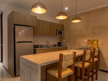 DEPARTAMENTO EN VENTA EN LA PLAYA CERCA DEL MAR EN CHICXULUB, AMUEBLADO
