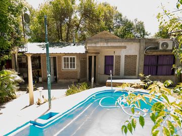 CASA EN VENTA 3 DORMITORIOS EN FUNES CON PILETA