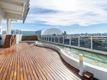Departamento tres ambientes con cochera y terraza propia en Torre en venta - Chacarita