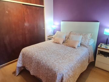 Lote  con dos viviendas, jardín y cochera en Florida Oeste- En Venta