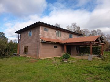 AMPLIA CASA EN PARCELA EN CHANCOYÁN ALTO