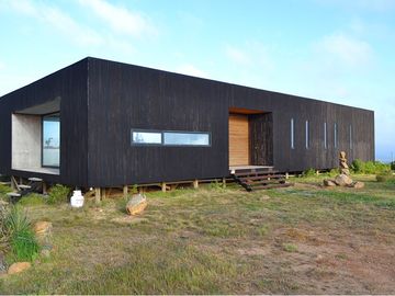 Parcela con casa vista al mar en Los Molles
