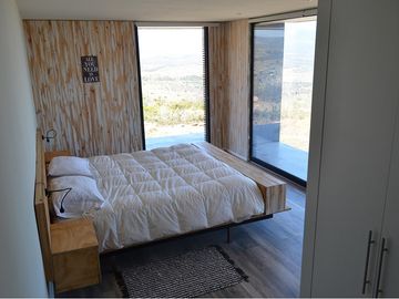 Parcela con casa vista al mar en Los Molles