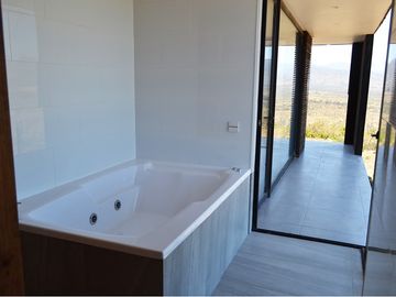 Parcela con casa vista al mar en Los Molles