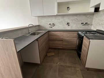 Departamento de tres ambientes con dos baños a Estrenar