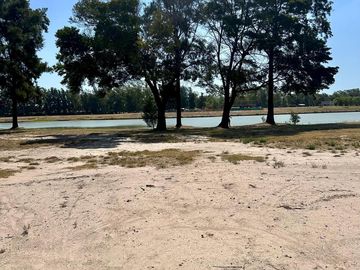 Terreno Sobre La Laguna en Azzurra, Tortugas, Pilar