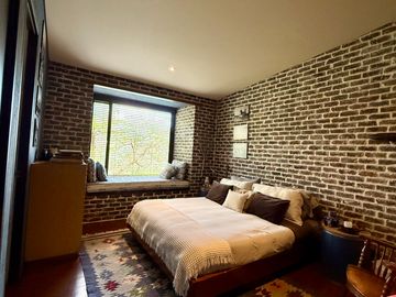 Casa campestre en loteo con portada para varias