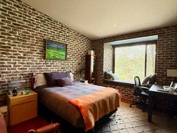 Casa campestre en loteo con portada para varias