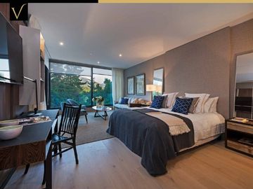 LUJOSO DEPARTAMENTO DÚPLEX CON JARDÍN