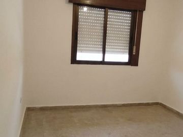 Lote con casa en venta en Benavidez para refacción