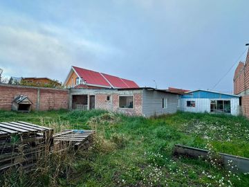 TERRENO DE 478 M2 Y VIVIENDA FRENTE AL RODOVIARIO DE NATALES
