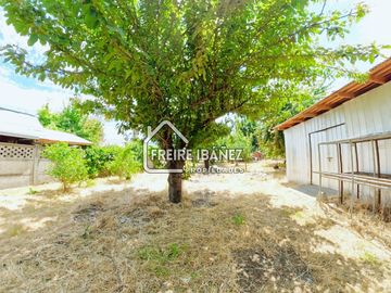 CENTRICO SITIO DE 1.320 M2 CON CASA Y GALPON