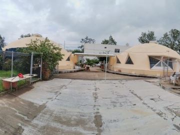 Expansivo Terreno con Construcciones en el Encantador San Agustín: ¡7,455 m de Oportunidad!