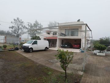 Expansivo Terreno con Construcciones en el Encantador San Agustín: ¡7,455 m de Oportunidad!