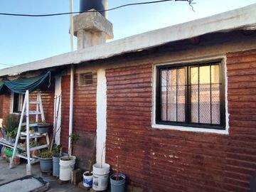 CASA CON DEPARTAMENTO CON AMPLIACION PARA LOCAL